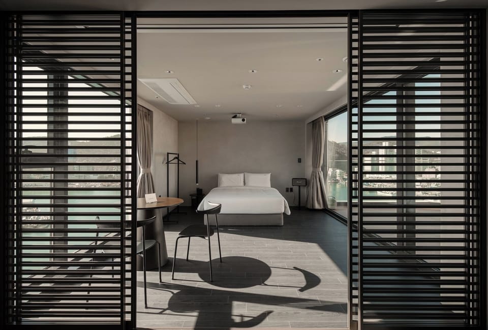 Deluxe Double Room, 1 Queen Bed, Balcony, Harbor View | Laptop workspace, free WiFi