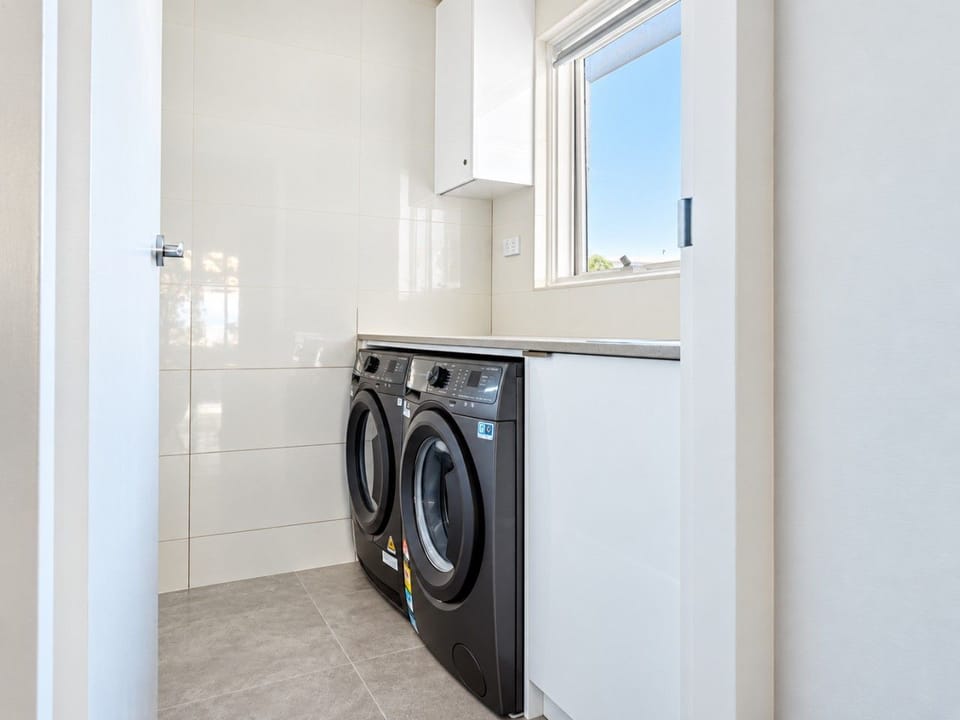 Laundry area with a washing machine and dryer