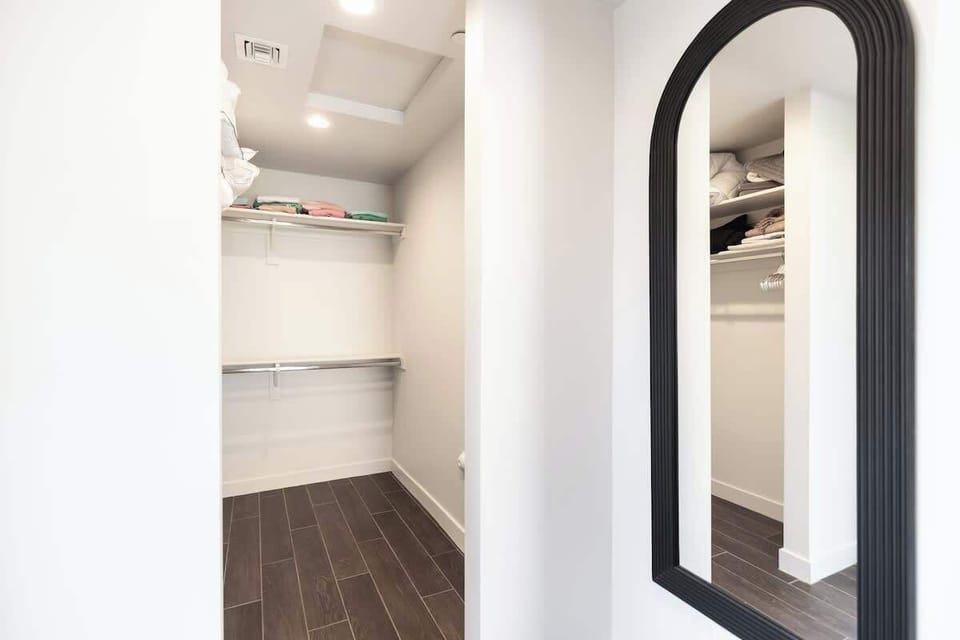 Full length mirror and walk in closet 