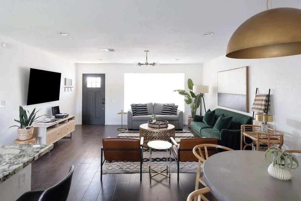 Grey couch can pull out into a full sized bed