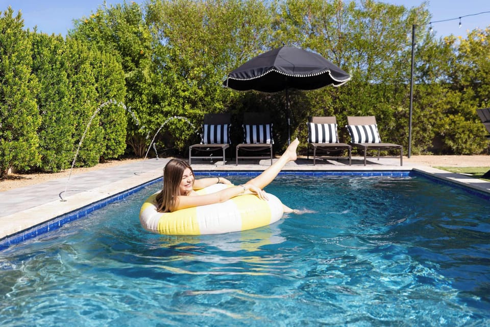 Private heated pool with plenty of space to cool off, lounge, and enjoy the backyard. A great setup for slow afternoons in the sun.