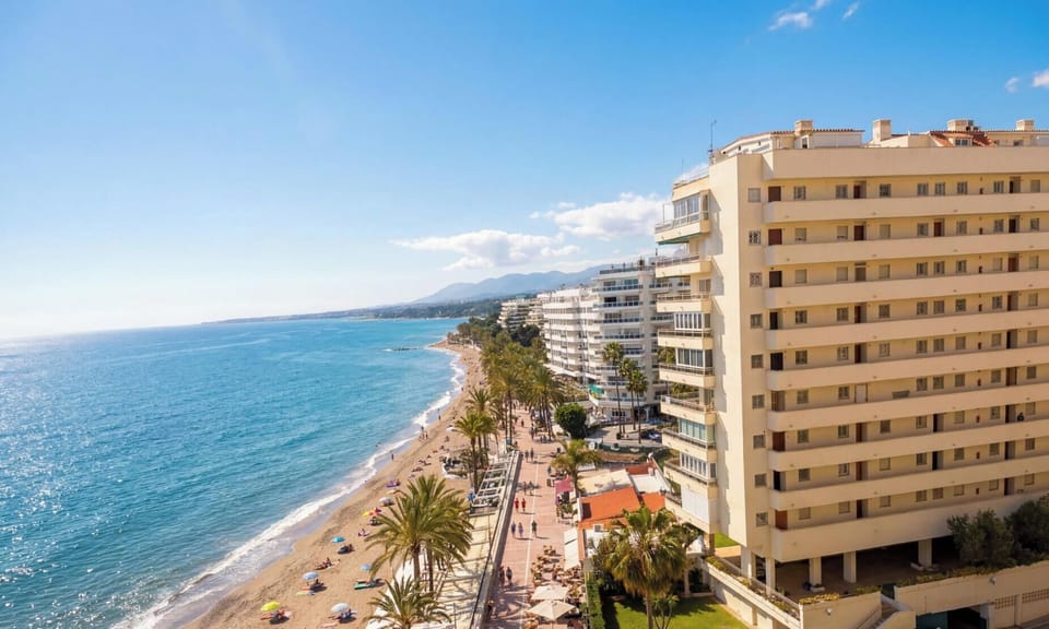 Overlooking beach and promenade.