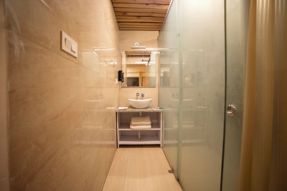 Shower, free toiletries, towels, soap