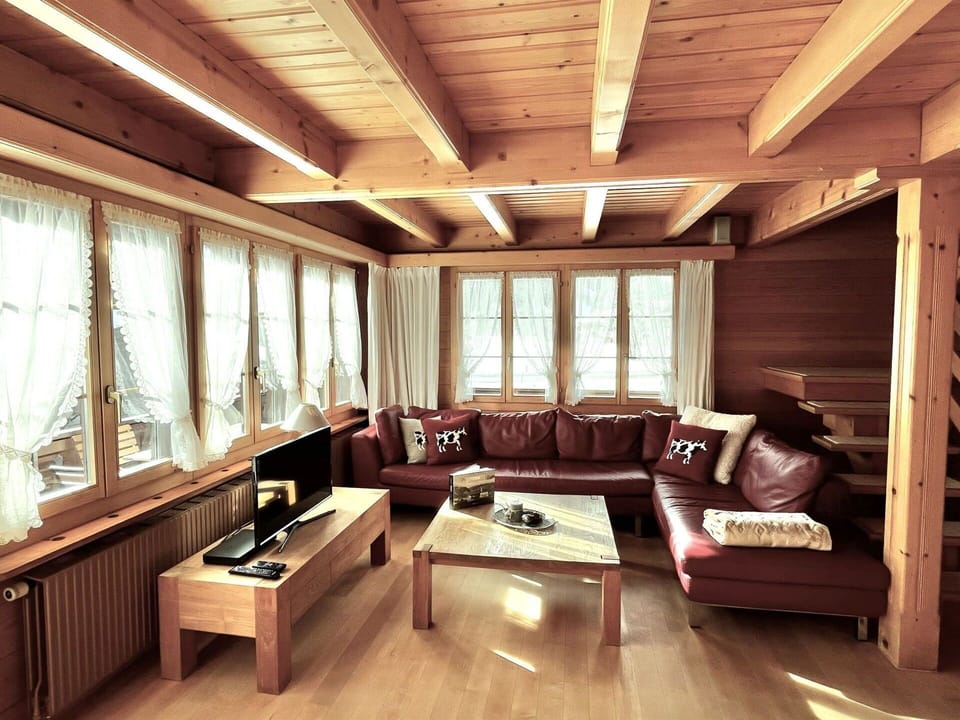 Furniture, Interior Design, Flooring, Floor, Wood, Ceiling, Wood Flooring, Couch, Living Room, Room