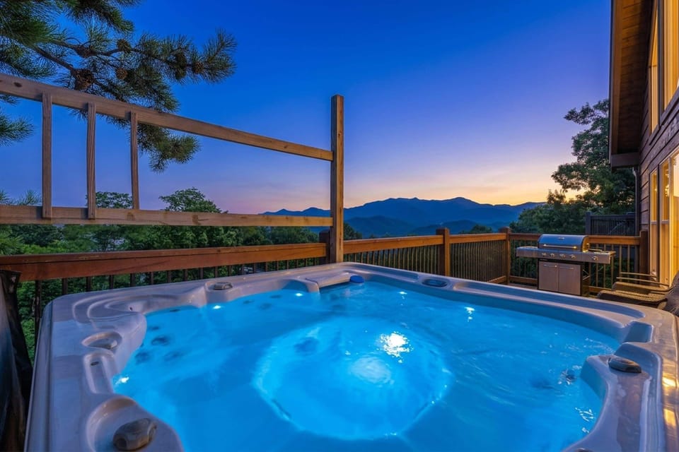 Slide into the hot tub right as the sky turns orange behind the ridge — the fifteen minutes you'll remember most from this trip.