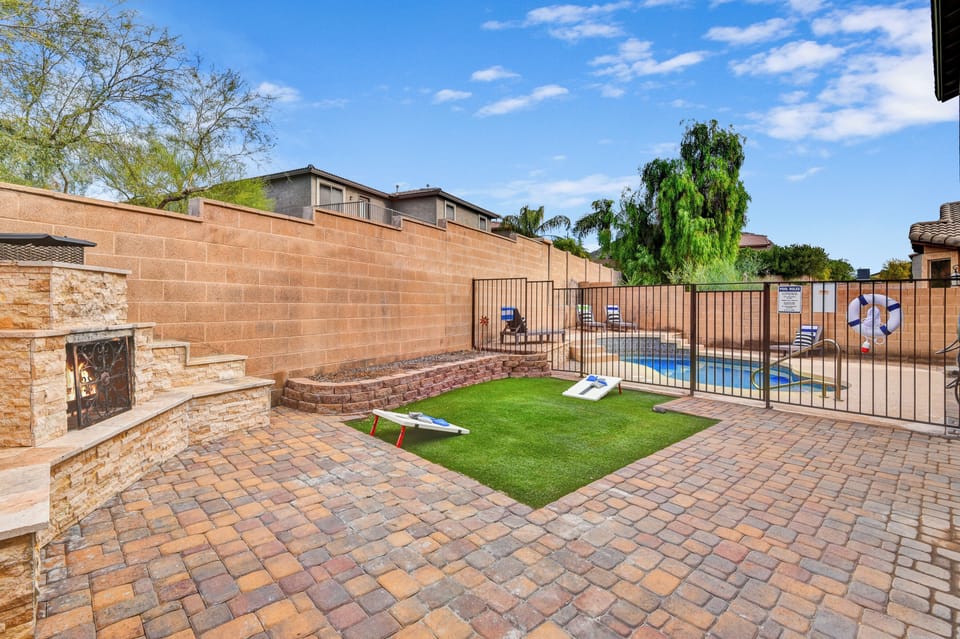 Private backyard with heated swimming pool