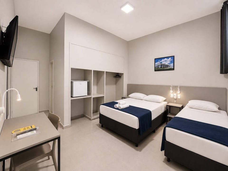 Economy Triple Room, Courtyard View | Desk, laptop workspace, WiFi (free)