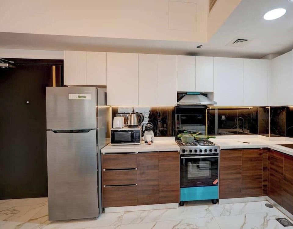 Luxury Apartment, Balcony, City View | Private kitchen | Full-size fridge, microwave, oven, stovetop