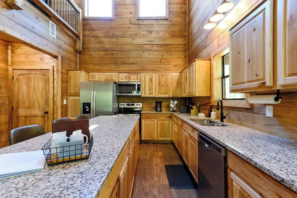 Cook like a chef with high-end cookware, modern appliances, and tons of counter space.