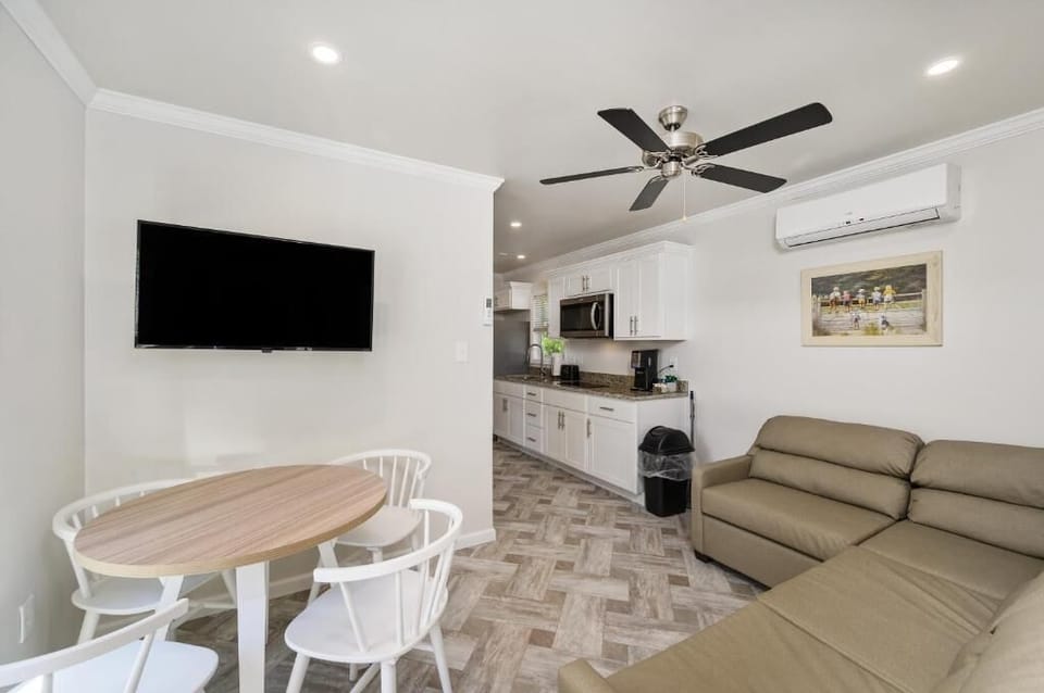 House, Multiple Beds, Pets Allowed | Living area | 45-inch LED TV with cable channels
