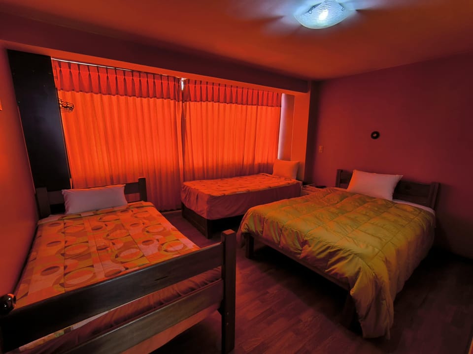 Classic Triple Room, Patio, City View | Desk, laptop workspace, blackout drapes, free WiFi