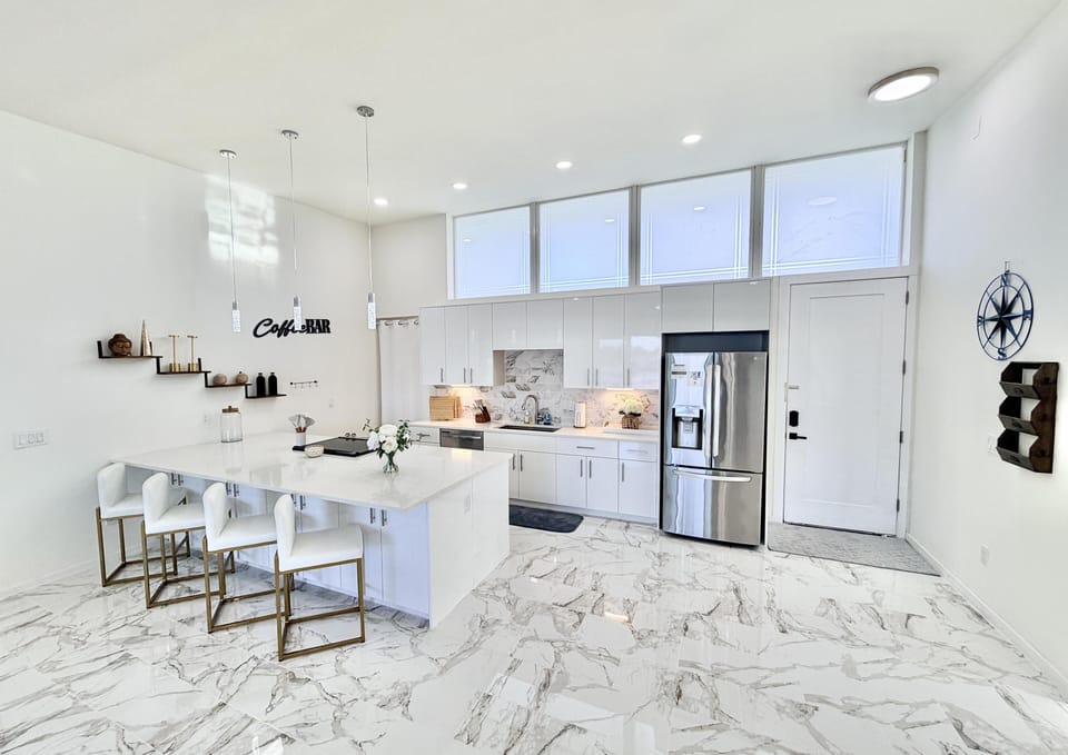 Bright modern kitchen with sleek island and bar seating