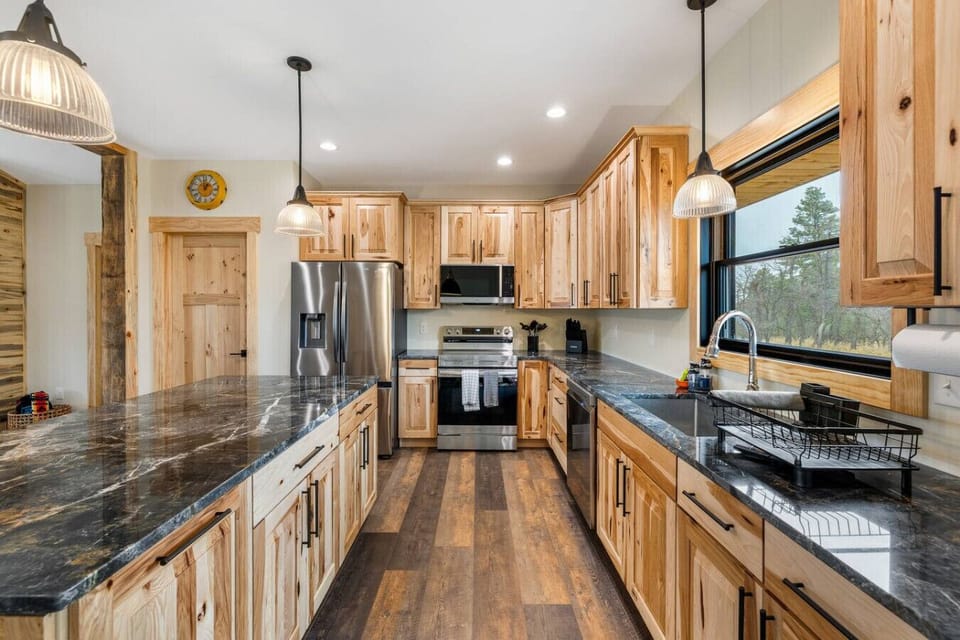 Gather around the spacious island with bar seating, perfect for casual dining or entertaining guests.