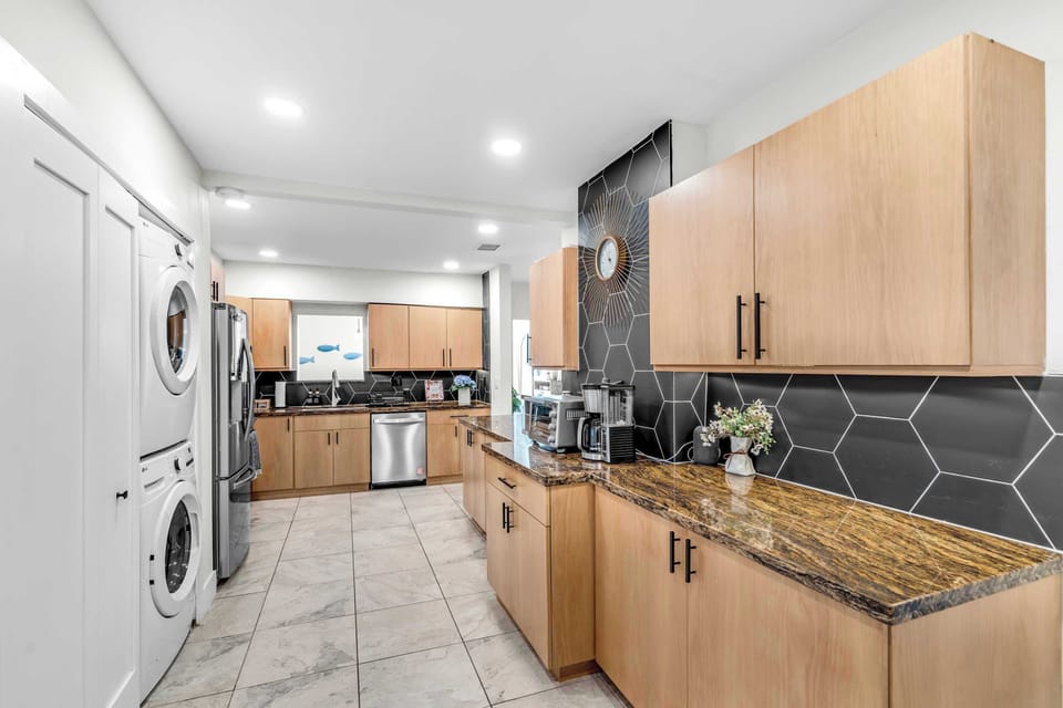 Fully Equipped Kitchen with Convenient Laundry