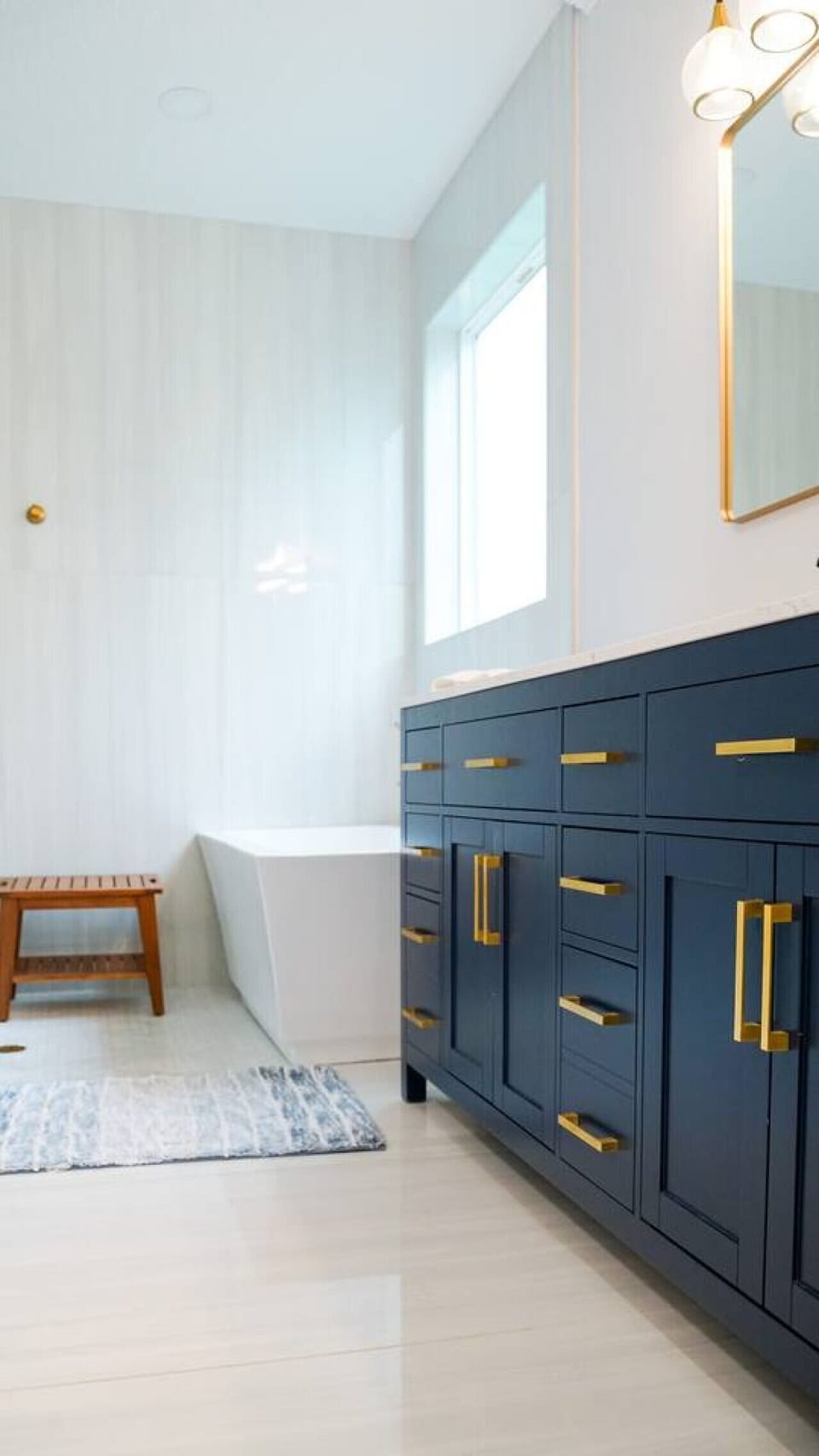 Primary bathroom designed for relaxation and convenience