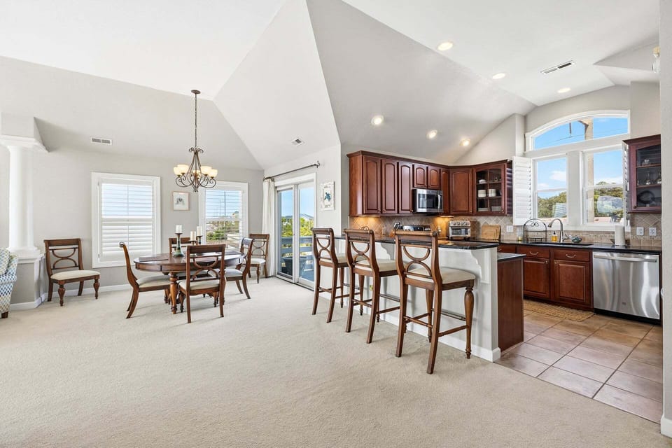Relax in the comfortable seating area while enjoying sweeping water views and your favorite shows on the smart TV.