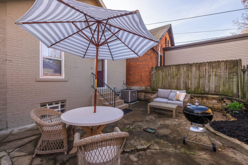 The patio space has areas for full sun or shade (plus grilling)
