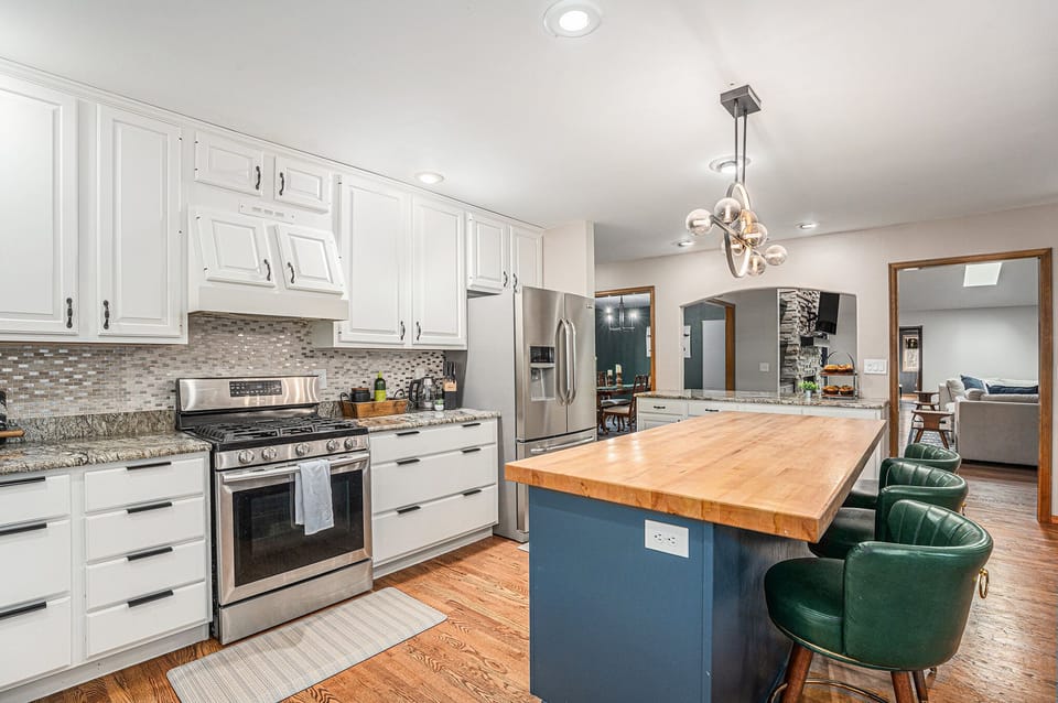 Gather around the spacious kitchen island to cook, snack, and share stories, all while enjoying a bright, modern space designed for effortless meals and meaningful moments together.