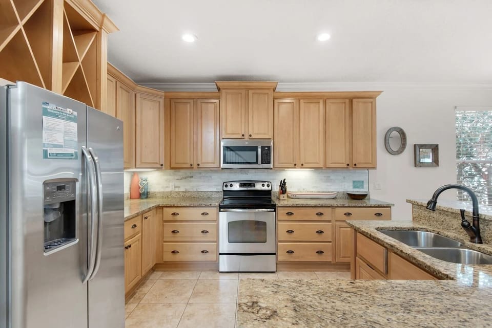 Set up for real cooking, for a family breakfast or group dinner, pots, pans, air fryer, blender, and both a K-Cup and drip coffee maker.