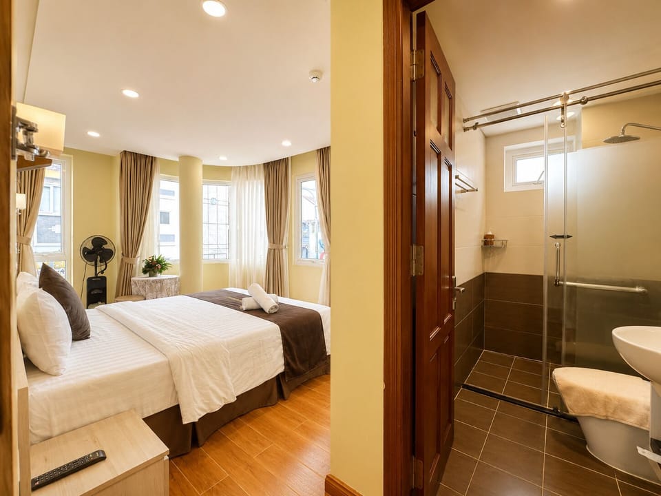 Premium Double Room, City View | Bathroom | Combined shower/tub, free toiletries, hair dryer, slippers