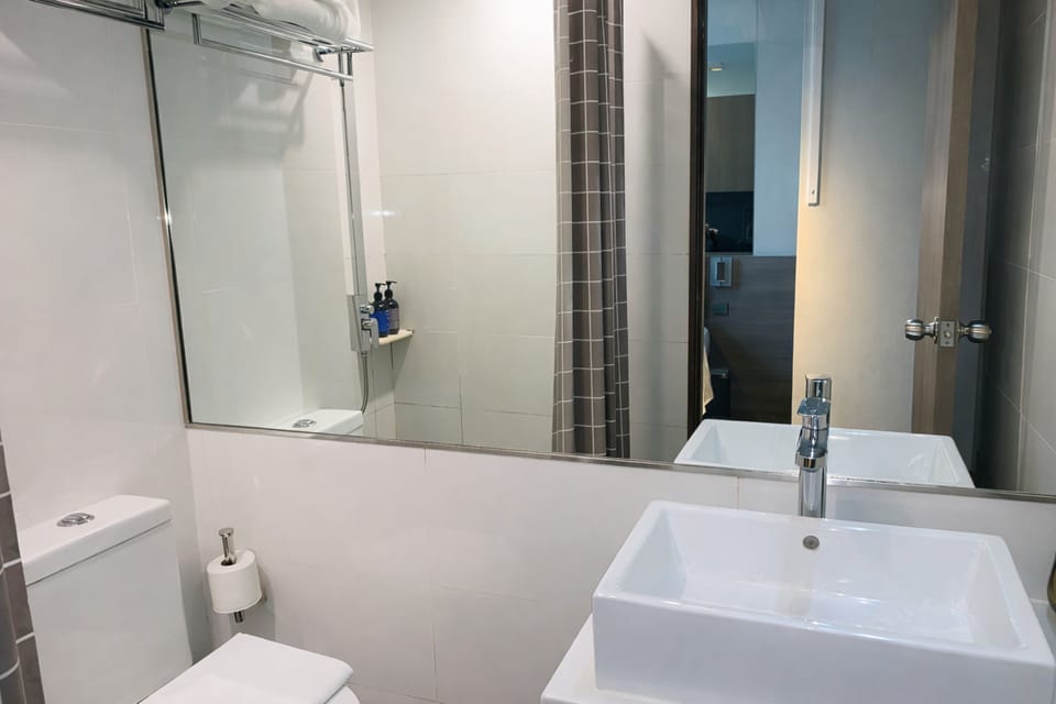 Superior Queen | Bathroom | Shower, rainfall showerhead, free toiletries, hair dryer