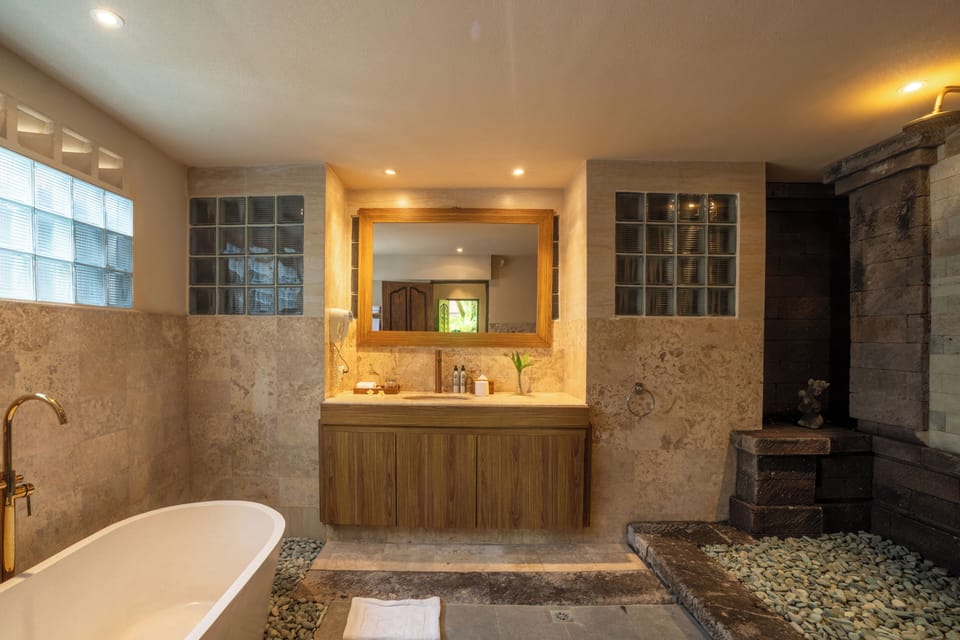 Aksara Taro | Bathroom | Separate tub and shower, free toiletries, hair dryer, towels