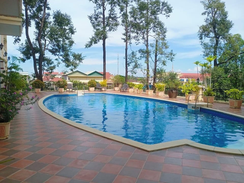 Deluxe Twin Room, City View | Pool | Outdoor pool