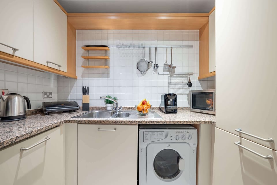 The kitchen is fully equipped to prepare a simple meal 