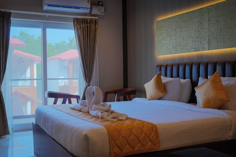 Deluxe Room, Balcony | In-room safe, iron/ironing board, free WiFi