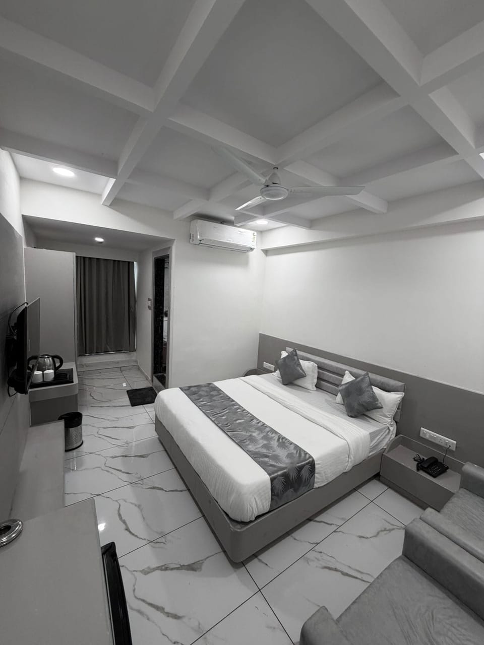 Deluxe Double Room, City View | In-room safe, desk, laptop workspace, iron/ironing board