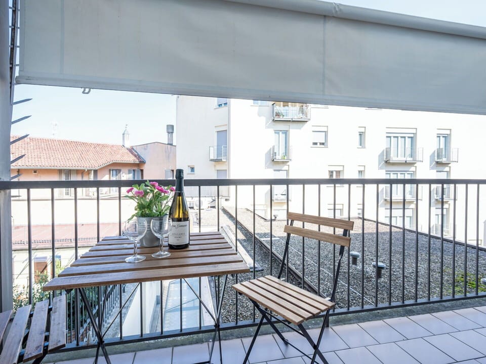 Furniture, Balcony, Chair, Shade, Porch, Outdoor Furniture, Fence, Outdoor Structure, Houseplant, Flowerpot