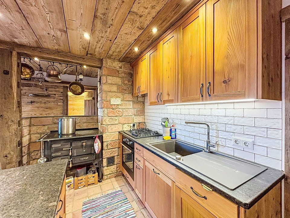Kitchen, Wood, Ceiling, Flooring, Interior Design, Countertop, Cabinetry, Kitchen Appliance, Floor, Furniture