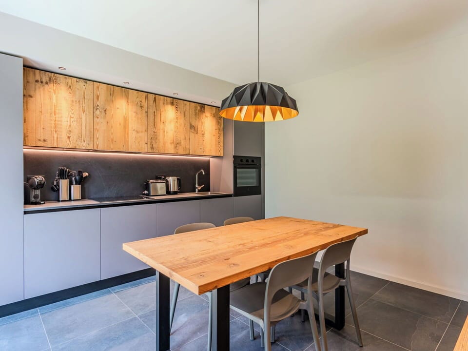 Furniture, Interior Design, Flooring, Countertop, Wood, Light Fixture, Ceiling, Floor, Kitchen, Kitchen & Dining Room Table