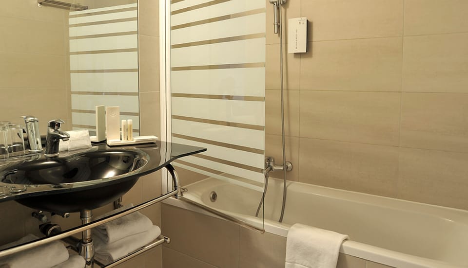 Ease into a warm bath with spa-like towels and lighting.