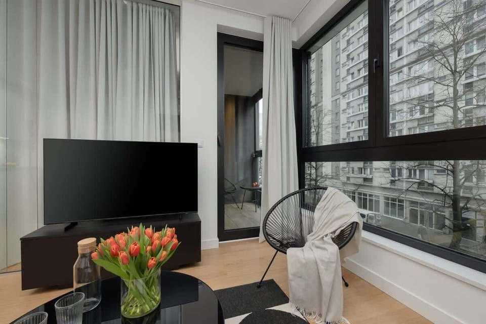 Elegant living room equipped with TV.