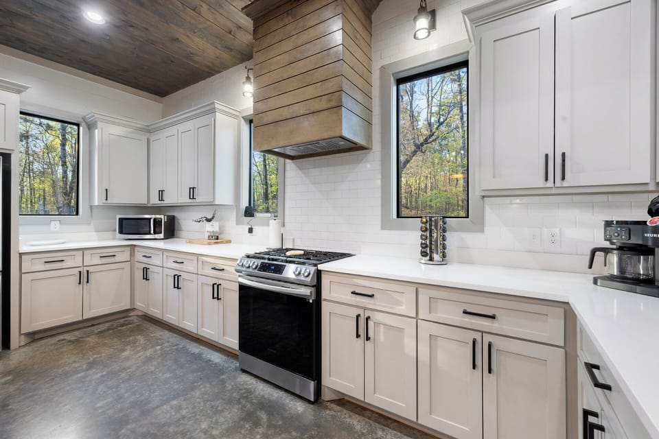 Bright, fully stocked kitchen with everything you need for meals in