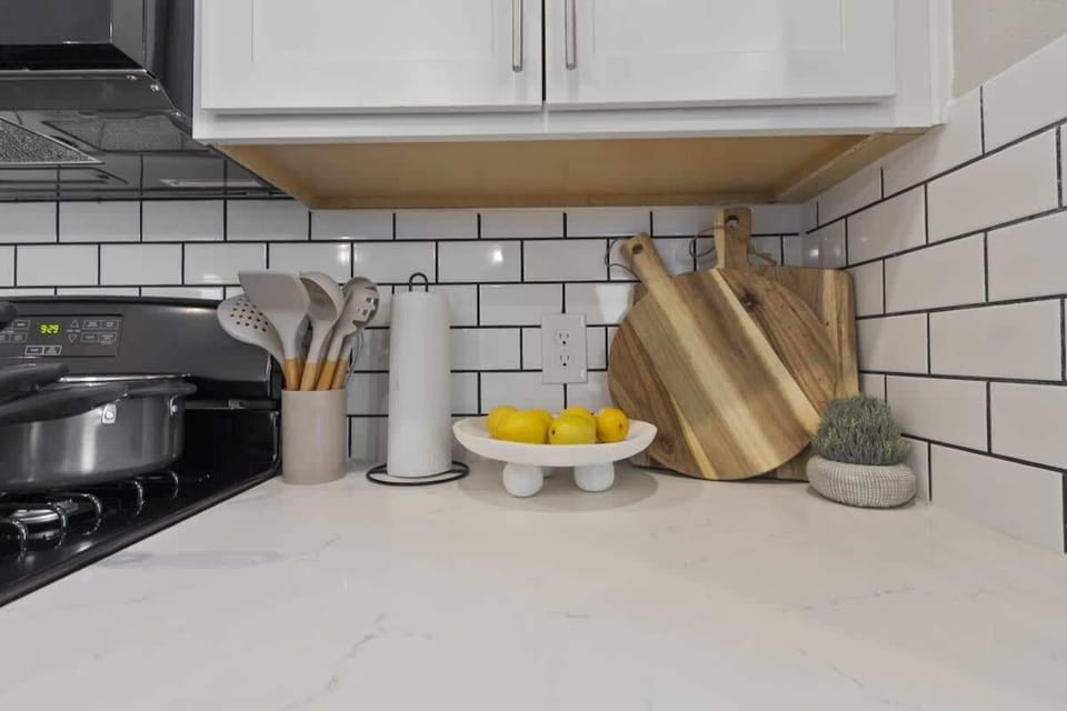 Bright chef’s kitchen with stove, microwave, and everything you need for home-cooked meals.
