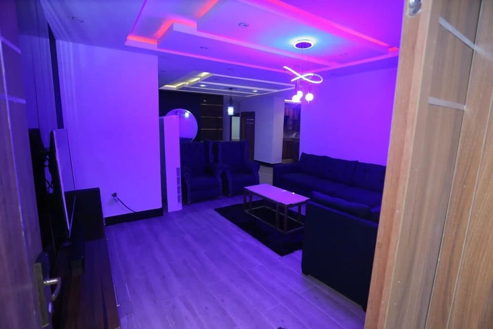 Deluxe Room, Balcony, City View | Living area