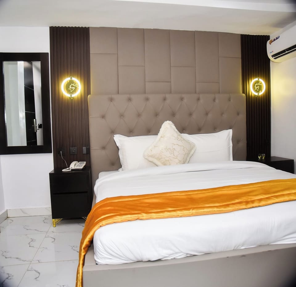 Deluxe Room, Balcony, City View | Desk, laptop workspace, blackout drapes, soundproofing