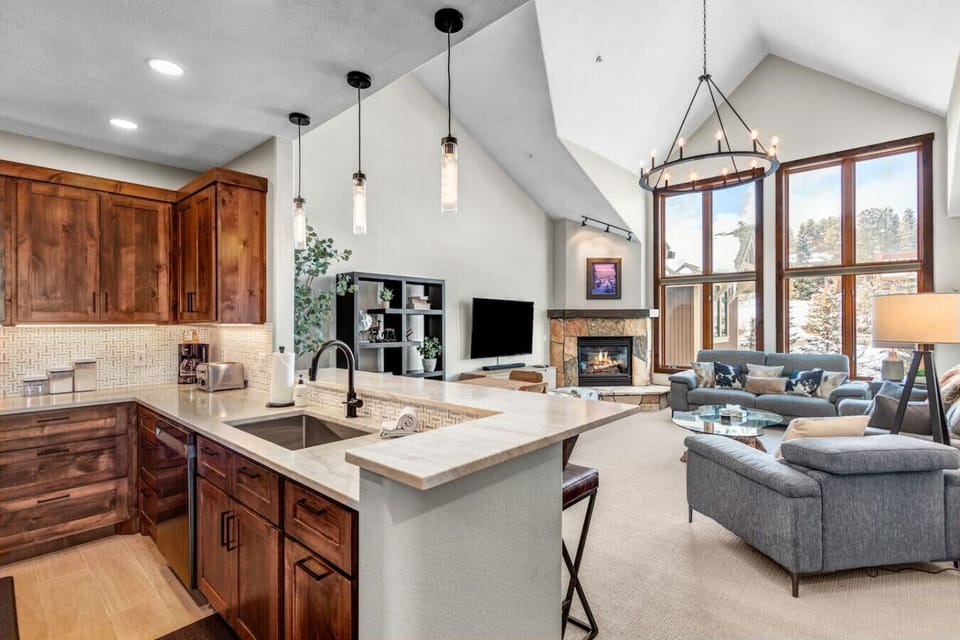 Open concept layout with vaulted ceilings and tons of natural light