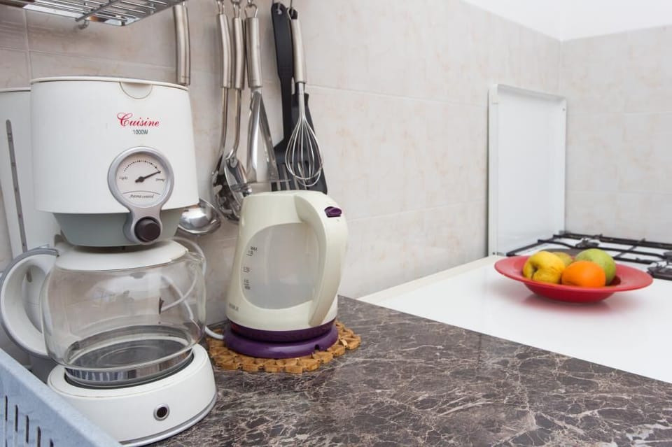 Apartment (Standard One-Bedroom Apartment with S) | Private kitchen | Fridge
