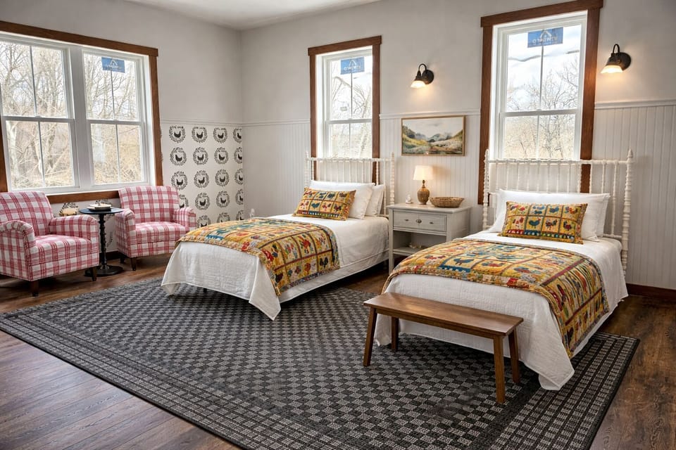 Rendering of bedroom on the main level with two queen beds.