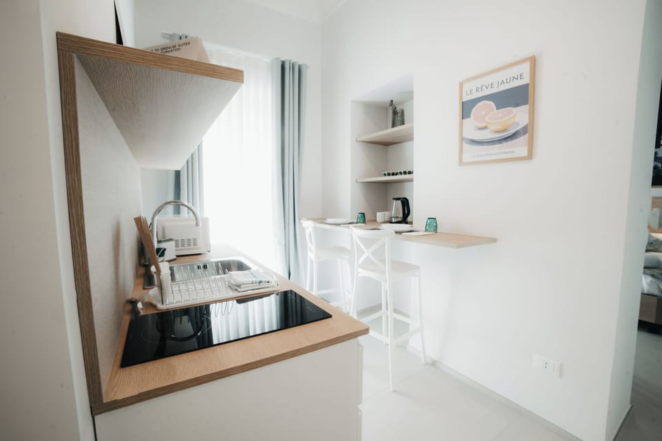 Double or Twin Room | Private kitchen | Espresso maker, coffee/tea maker, electric kettle, highchair