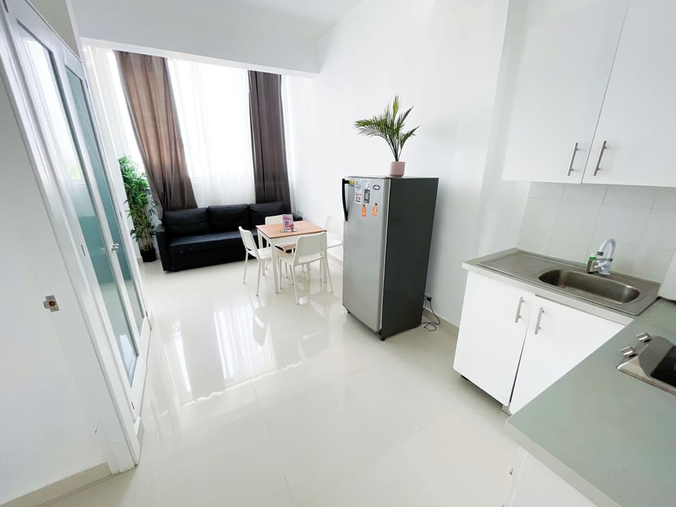 Exclusive Studio, Pool Access, City View | Living area | 32-inch LCD TV with cable channels