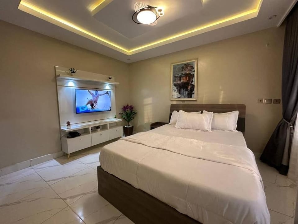 Deluxe Room, Balcony, City View | In-room safe, desk, laptop workspace, blackout drapes