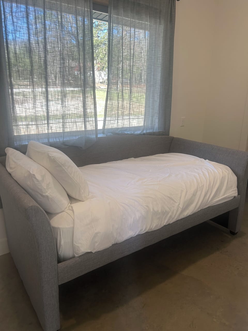 First floor small bedroom with twin bed right off master