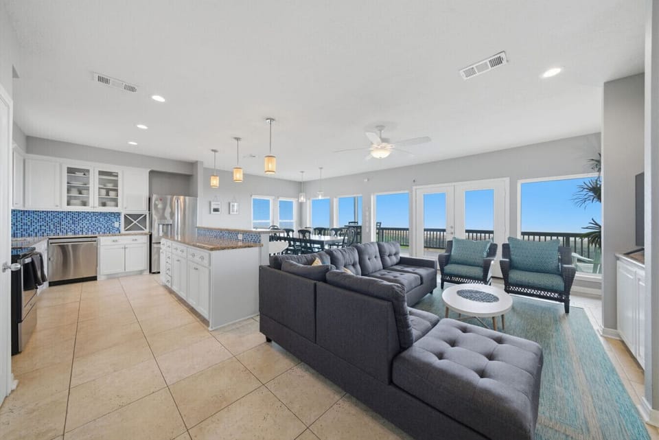 Enjoy seamless living with ocean views just beyond
