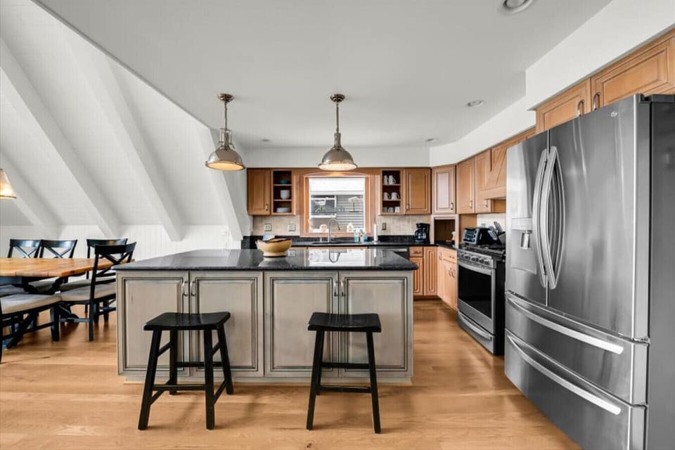 Kitchen, dining, living. All connected so nobody misses a moment.