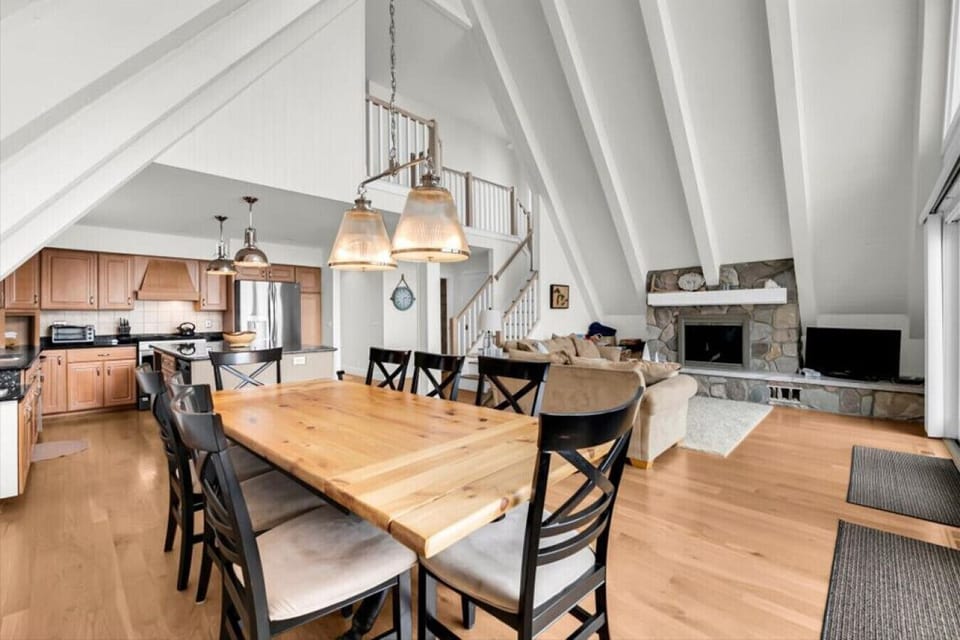 High ceilings, fireplace, and a living space you will not rush out of.