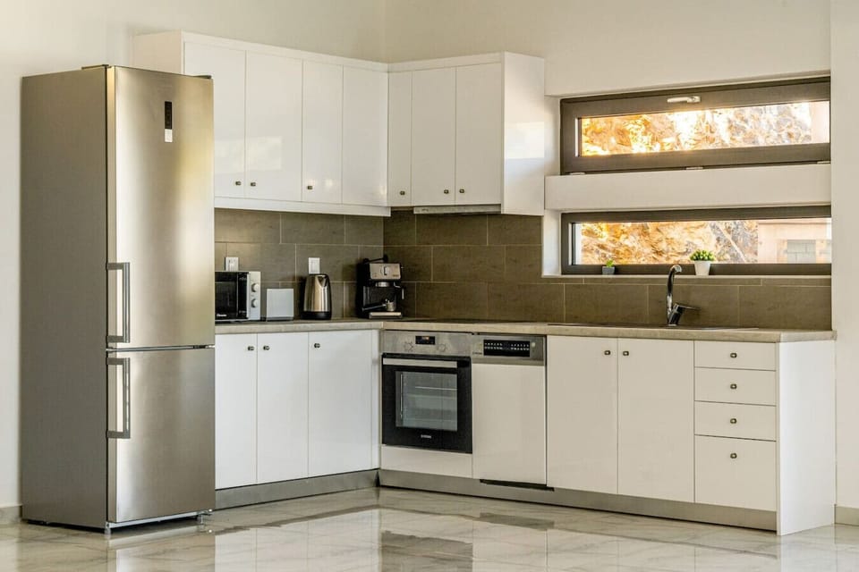 Fully equipped kitchen with modern appliances, cookware, and essentials—ideal for guests who enjoy home-cooked meals.